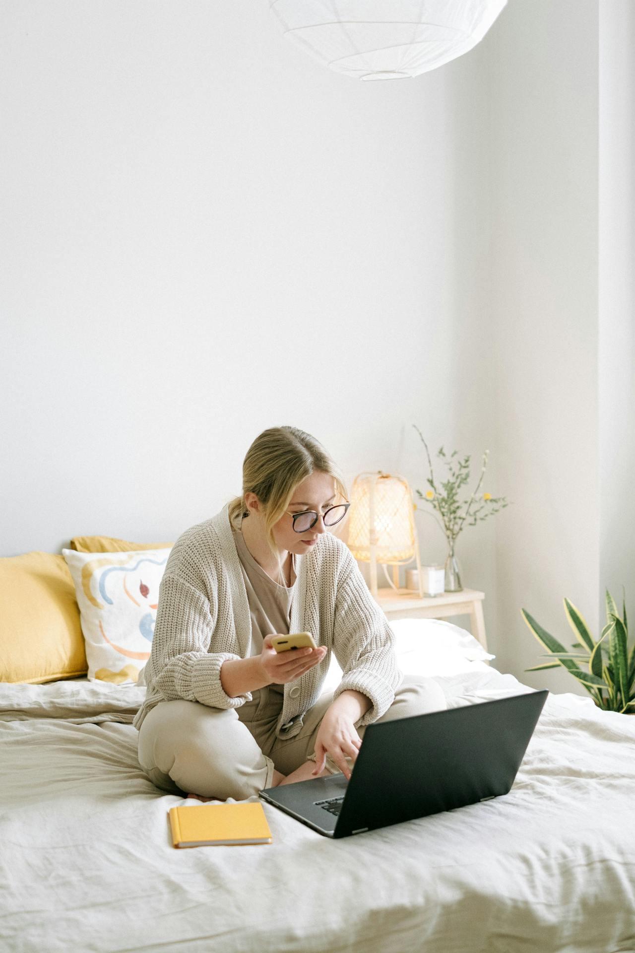 A lady studying an IVA on the debt helplines website